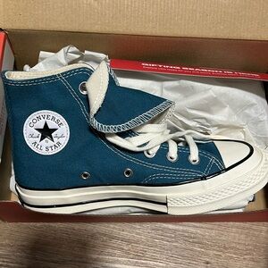 Brand new high top converse . Never been worn
